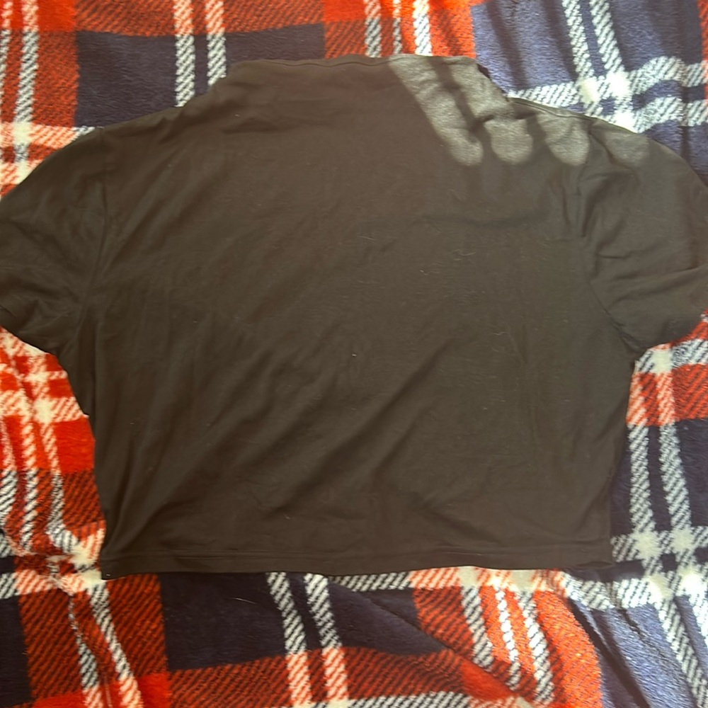 Black crop top shirt never worn in a size medium